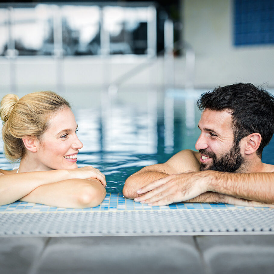 Picture of happy couple relaxing in spa pool