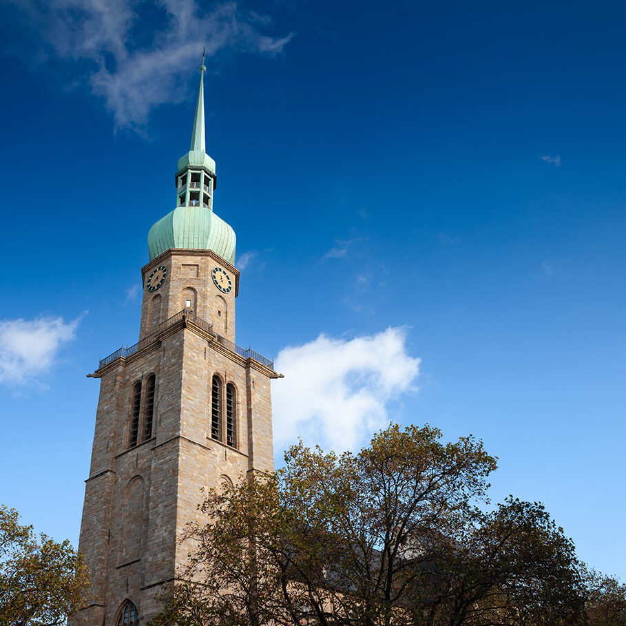 Picture of the chuch of reinoldikirche church in Dortmund, Germany. The Lutheran Protestant Church of St. Reinold is, according to its foundation date, the oldest extant church in Dortmund, Germany; it is dedicated to Reinold, also known as Renaud de Montauban, the patron of the city. The church was built as a palatine church in the Ottonian era. The present building is a late Romanesque church with a late gothic quire. St. Reinold's was built from 1250 to 1270, and is located in the centre of the city, directly at the crossing of the Hellweg (a historic trade route) and the historic road from Cologne to Bremen. St. Reinoldi's congregation is a member of the Evangelical Church of Westphalia, an umbrella comprising Lutheran, Reformed and united Protestant congregations.