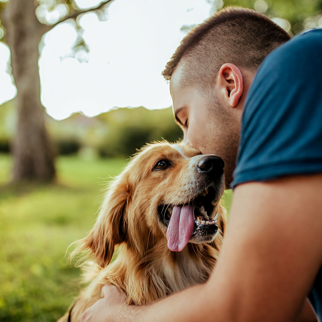 Man with his dog- public park.